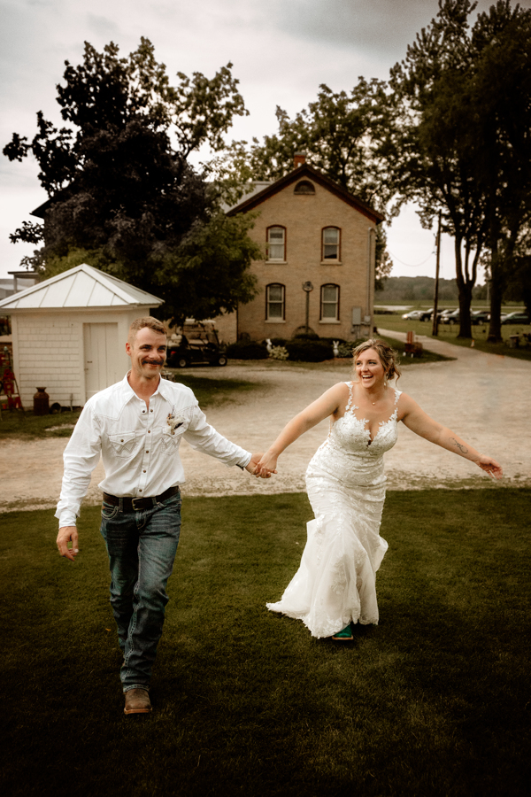 bride and groom portraits at sunset at  Mulberry Lane Farms Venue in Wisconsin