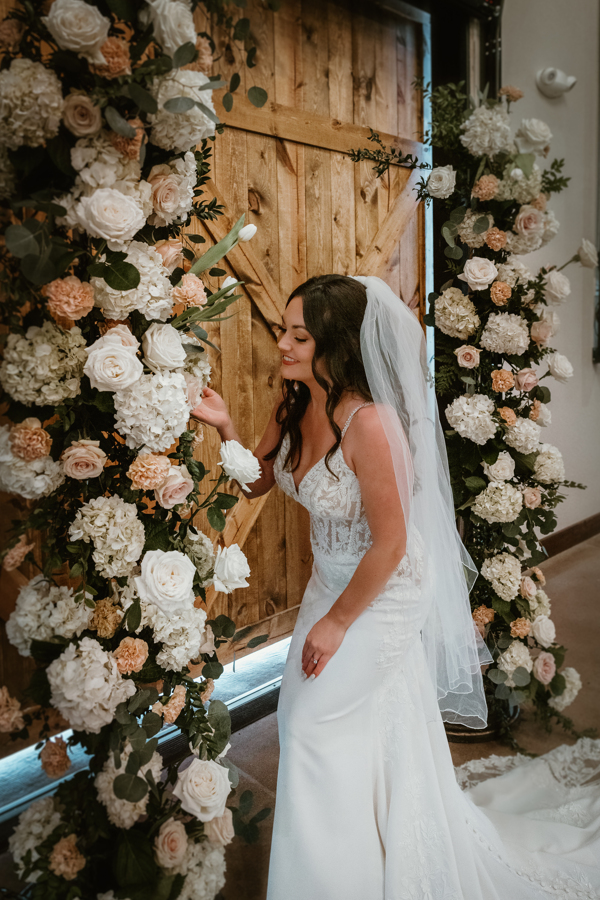 floral arch at wedding ceremony