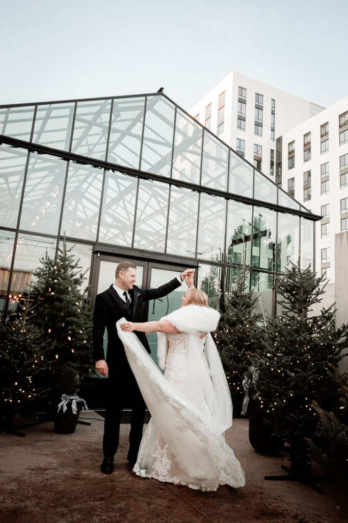 Bride and Groom celebrating their wedding at The Tinsmith in Madison, Wisconsin