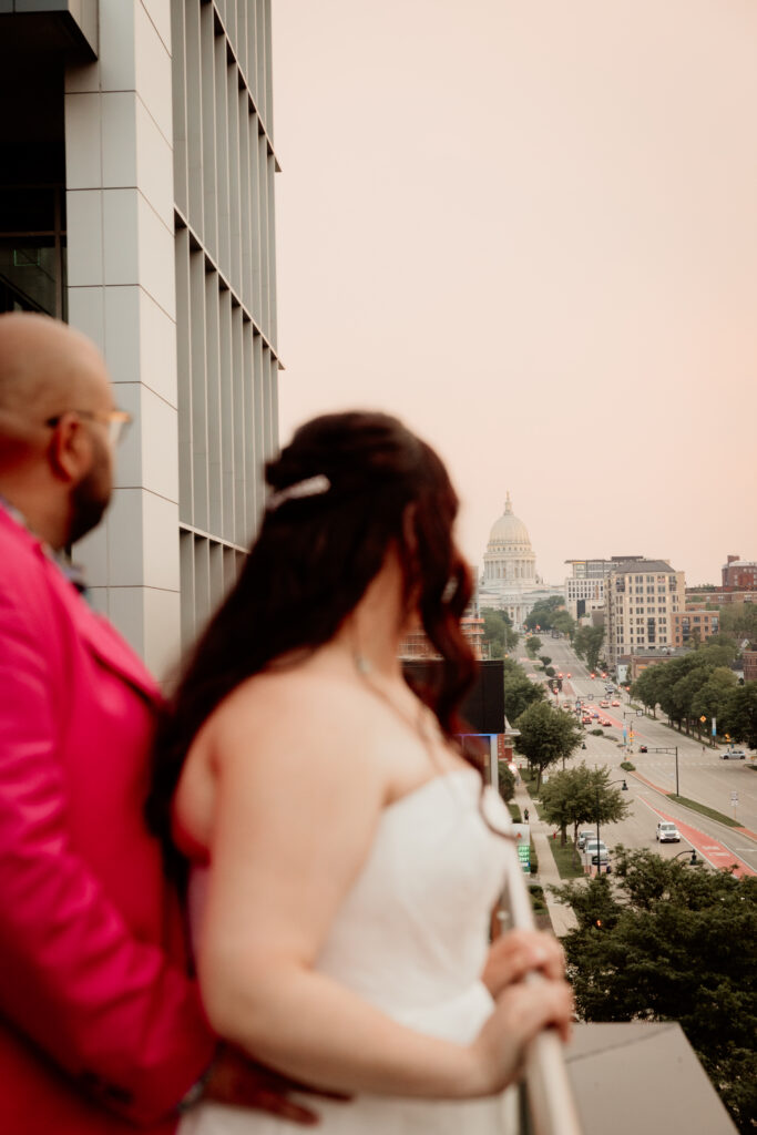 Bride and Groom taking a moment with the Wisconsin State Capital in background.

