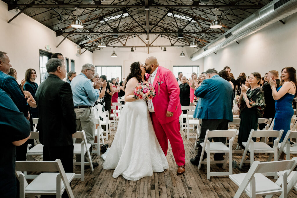 Bride and Groom celebrating their wedding at The Tinsmith in Madison, Wisconsin