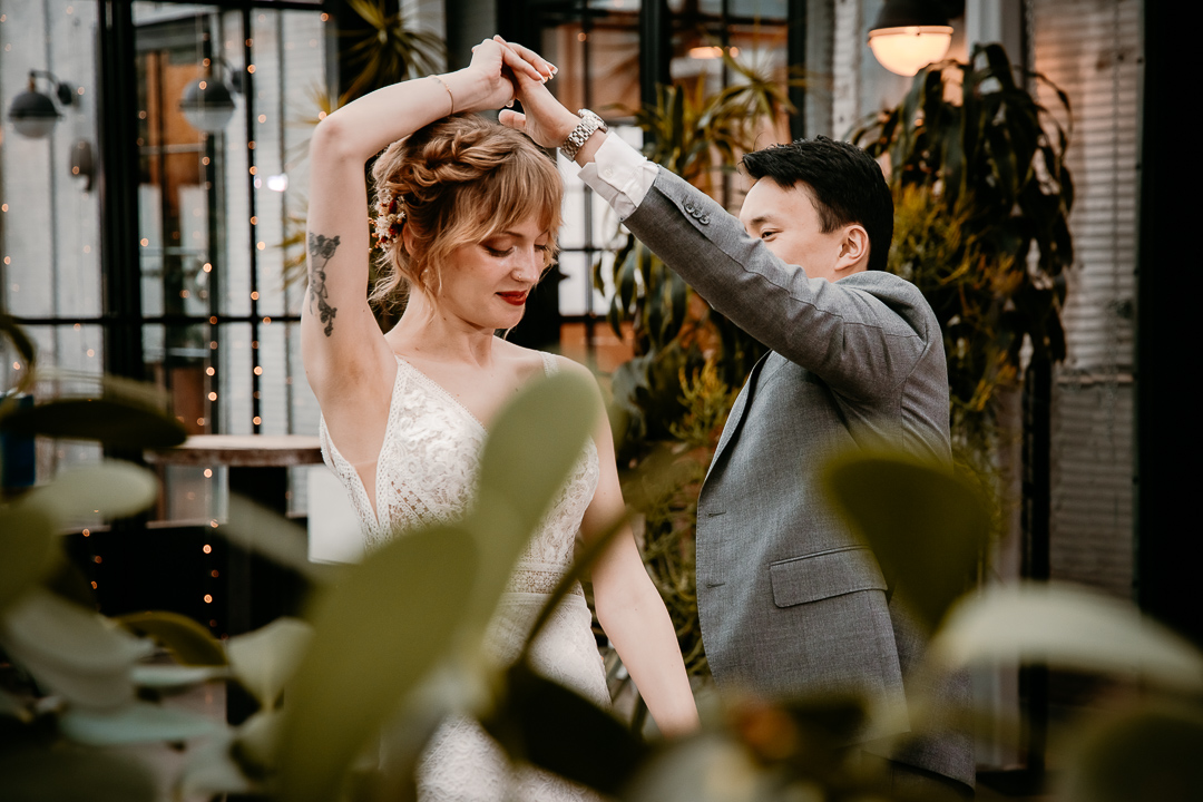 Bride and Groom celebrating their wedding at The Tinsmith in Madison, Wisconsin