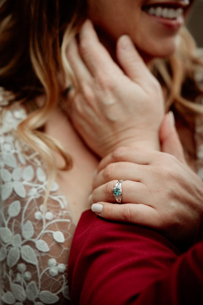 Two brides share a joyful moment during their wedding at the Old Schoolhouse in Merrimac, Wisconsin.