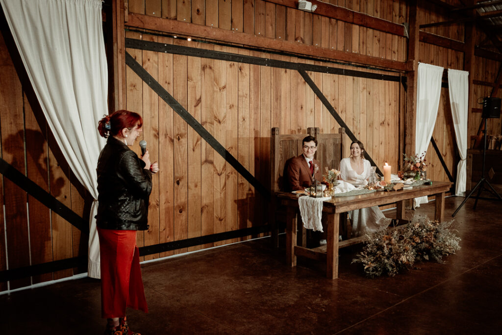 Toasts during wedding reception at Burlap and Bells in Black River Falls, WI