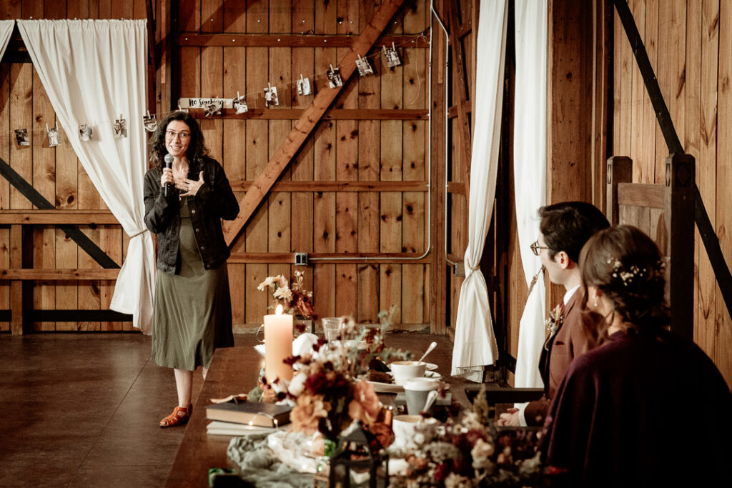 Toasts during wedding reception at Burlap and Bells in Black River Falls, WI