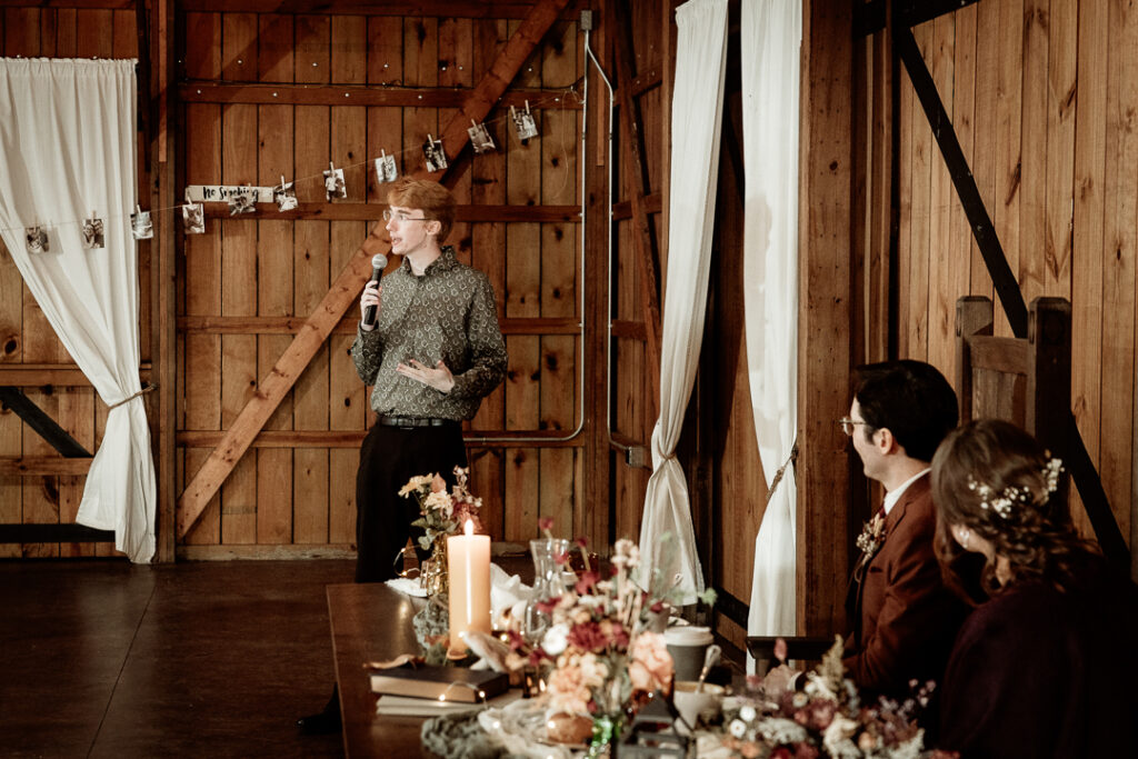 Toasts during wedding reception at Burlap and Bells in Black River Falls, WI