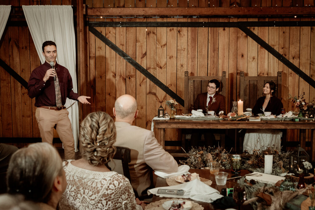 Toasts during wedding reception at Burlap and Bells in Black River Falls, WI