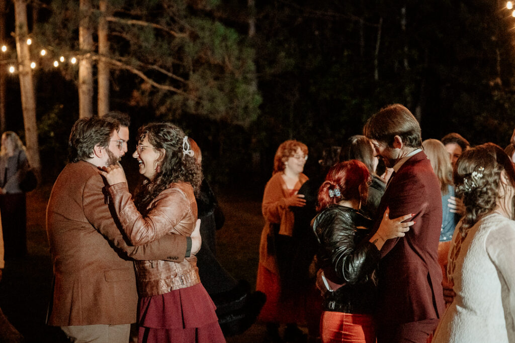 Dancing under the stars during wedding reception at Burlap and Bells in Black River Falls, WI
