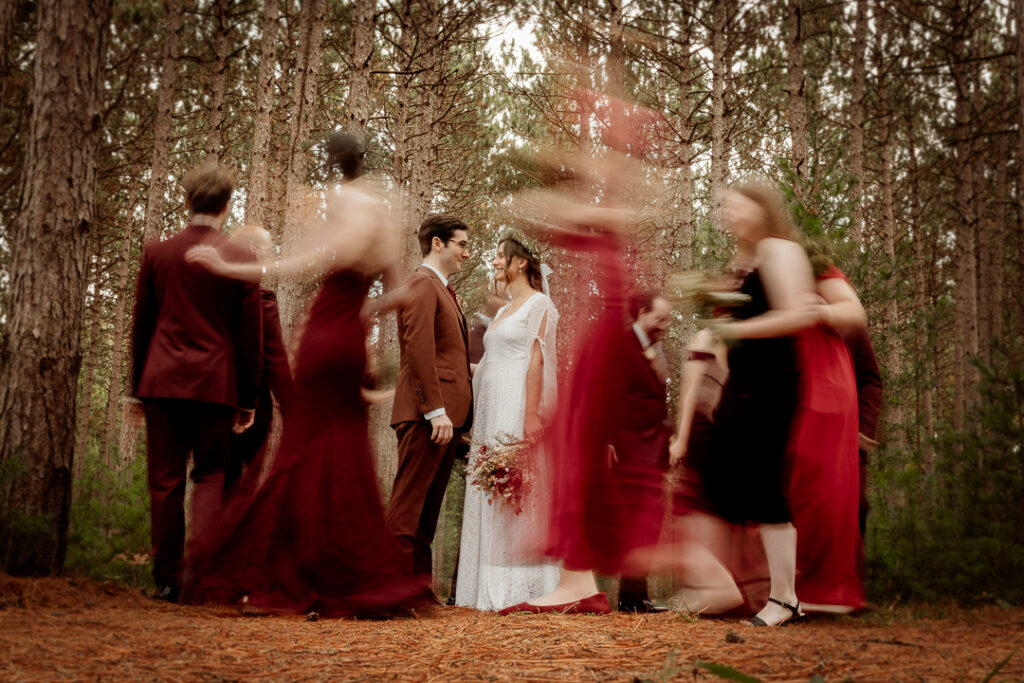 Bridal party celebrating their wedding at Burlap and Bells in Black River Falls, WI