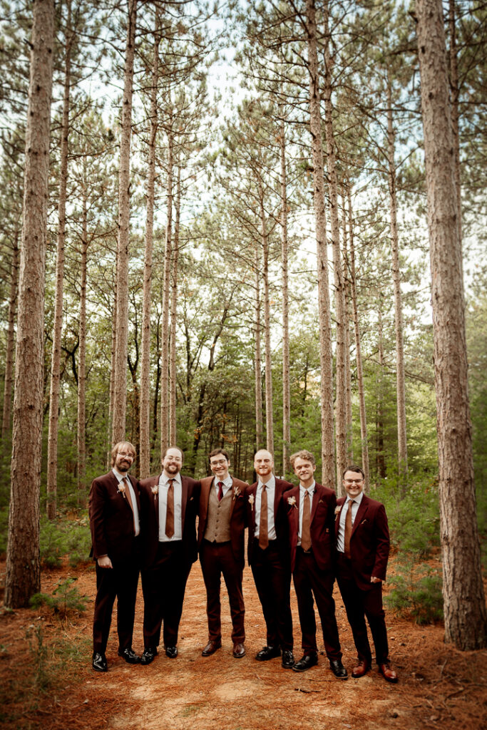Groom celebrating his wedding at Burlap and Bells in Black River Falls, WI