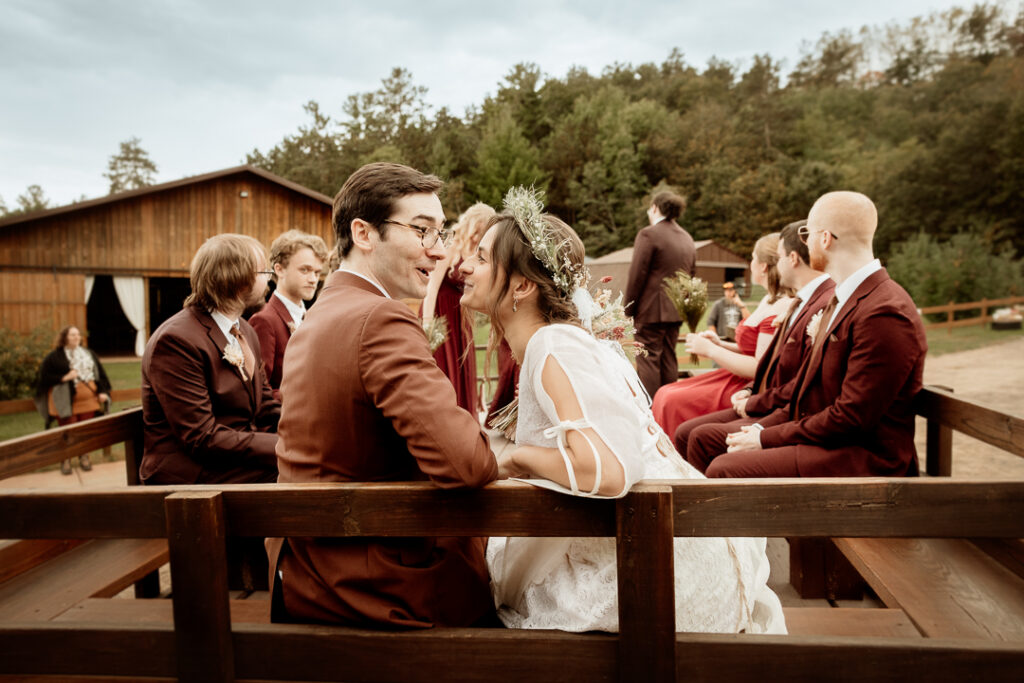 Bride and Groom celebrating their wedding at Burlap and Bells in Black River Falls, WI